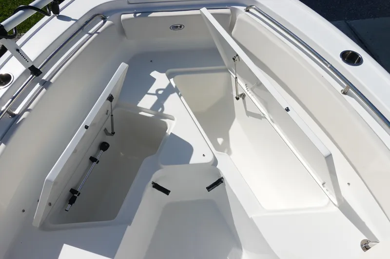 Slide: The Image of Open storage compartment on 2025 Sea Hunt Ultra 239 SE boat. - 32