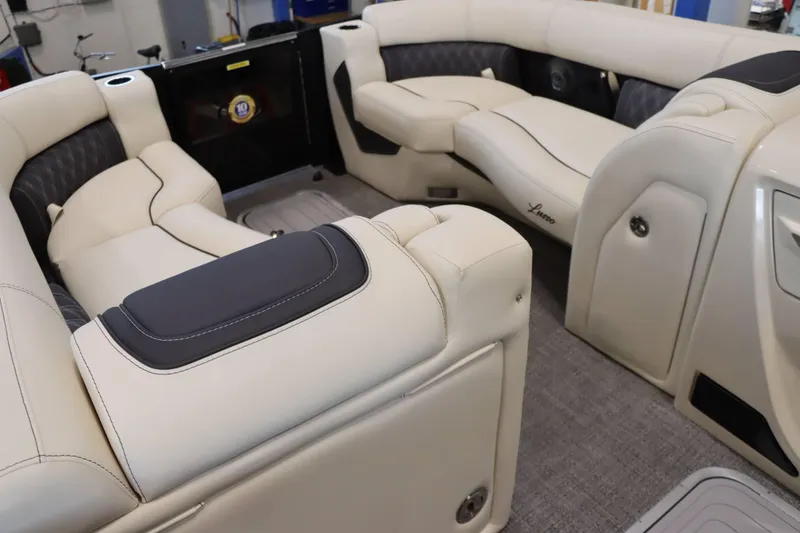 Slide: The Image of 2025 Barletta Lusso 23U boat interior with luxurious seating and modern design. - 11