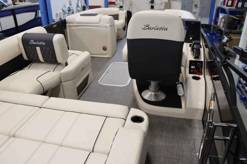Slide: The Image of Interior of 2025 Barletta Lusso 23U pontoon boat with luxurious seating and helm. - 6