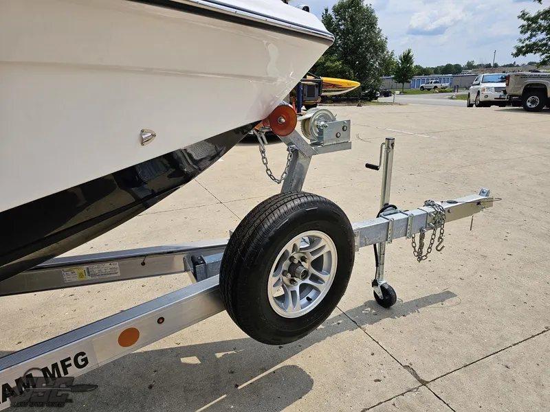 Slide: The Image of 2024 Glasstream 280 Pro GSX boat on a trailer, close-up of the bow and trailer hitch. - 21