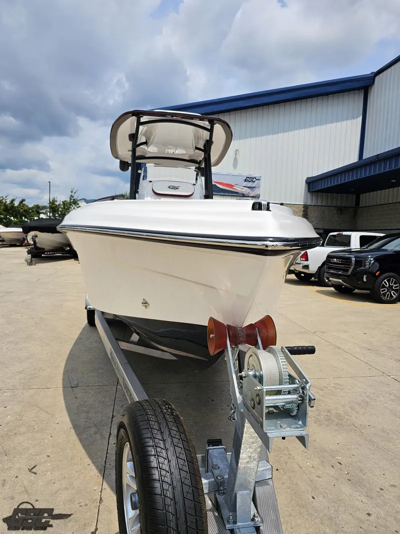Slide: The Image of 2024 Glasstream 280 Pro GSX boat on a trailer in a parking lot. - 23