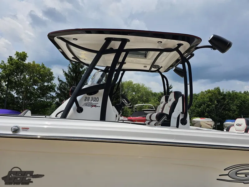 Slide: The Image of 2024 Glasstream 280 Pro GSX boat with T-top and seating, side view. - 32