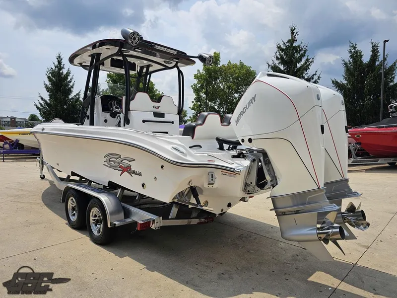 Slide: The Image of 2024 Glasstream 280 Pro GSX boat with dual Mercury engines on a trailer. - 39