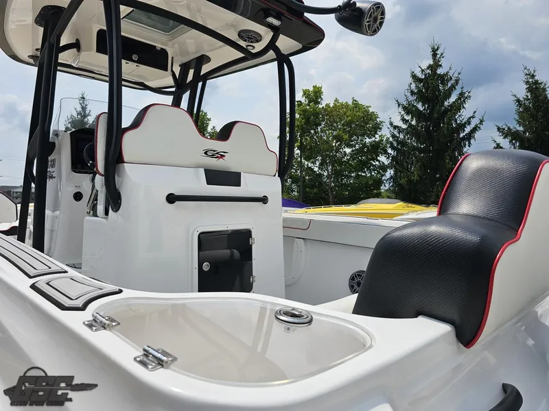 Slide: The Image of 2024 Glasstream 280 Pro GSX boat interior with seating and console. - 42