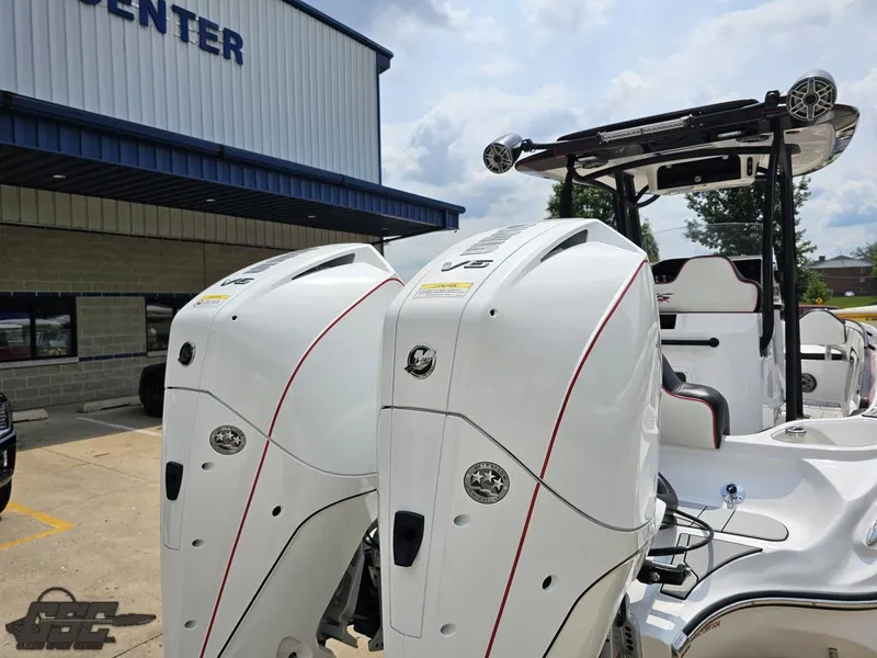 Slide: The Image of 2024 Glasstream 280 Pro GSX boat with dual outboard engines at dealership. - 49