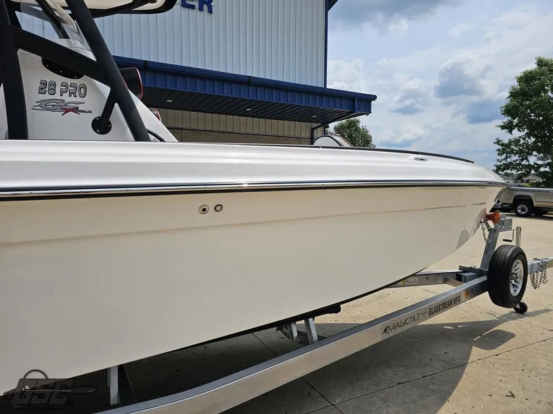 Slide: The Image of 2024 Glasstream 280 Pro GSX boat on a trailer, side view. - 8