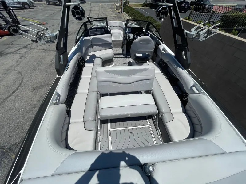 Slide: The Image of 2017 Malibu Wakesetter 25 LSV boat interior with spacious seating and modern design. - 16