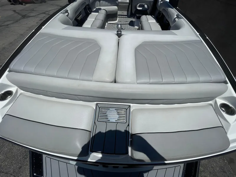 Slide: The Image of 2017 Malibu Wakesetter 25 LSV boat interior with gray seating. - 6