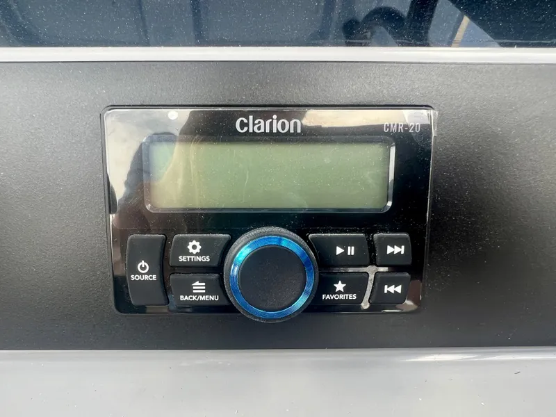 Slide: The Image of Clarion CMR-20 control panel on 2025 Robalo 266 Cayman SD boat. - 18