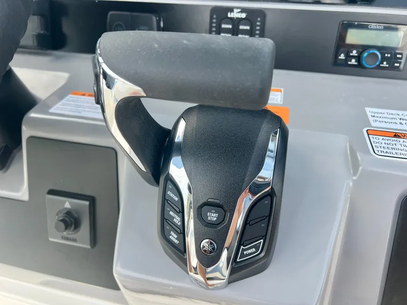 Slide: The Image of Close-up of the control panel on a 2025 Robalo 266 Cayman SD boat. - 21