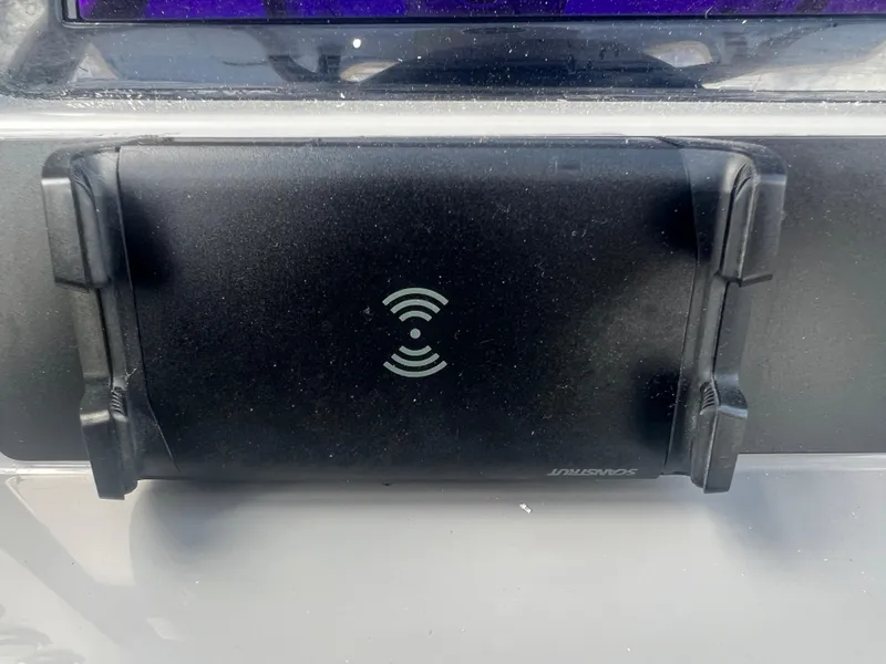 Slide: The Image of Wireless charging pad on 2025 Robalo 266 Cayman SD boat. - 25