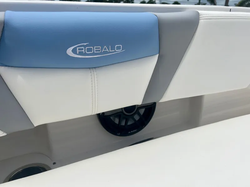 Slide: The Image of Close-up of 2025 Robalo 266 Cayman SD boat seat and speaker. - 31