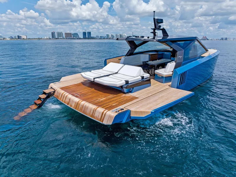 Slide: The Image of 2023 Wally WALLYPOWER58 yacht on open water, featuring sleek design and luxurious deck. - 10
