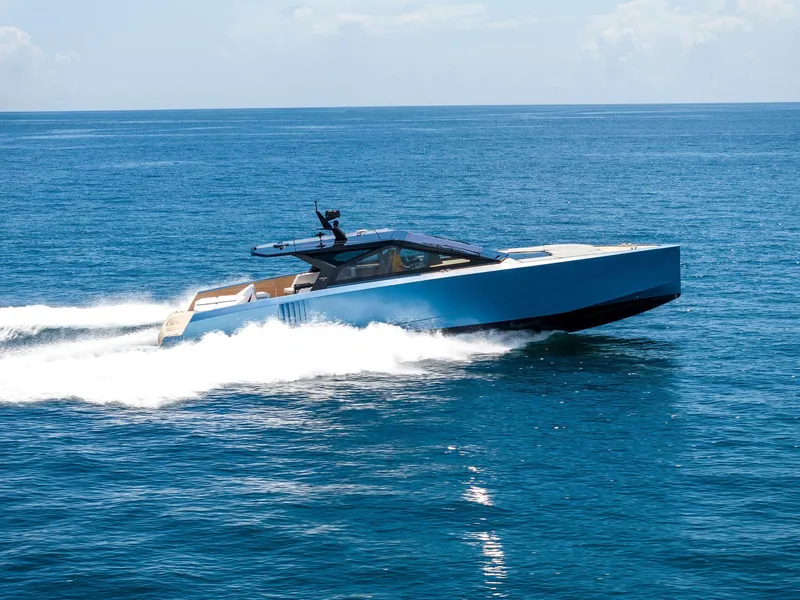 Slide: The Image of 2023 Wally WALLYPOWER58 yacht cruising on open sea, showcasing sleek design and speed. - 13