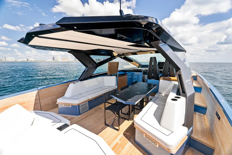 Slide: The Image of 2023 Wally WALLYPOWER58 luxury yacht interior with sleek design and ocean view. - 14