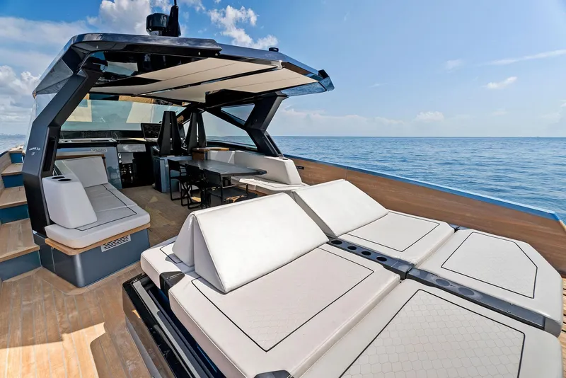Slide: The Image of Luxurious 2023 Wally WALLYPOWER58 yacht interior with sun loungers and ocean view. - 17