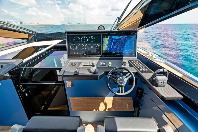 Slide: The Image of 2023 Wally WALLYPOWER58 yacht cockpit with advanced navigation system and ocean view. - 21