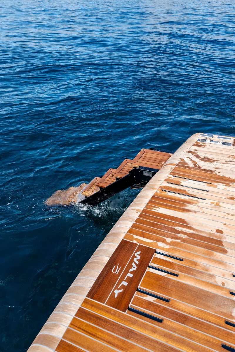 Slide: The Image of Luxury 2023 Wally WALLYPOWER58 yacht with wooden deck and sea view. - 22