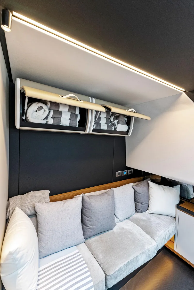 Slide: The Image of Luxurious interior of 2023 Wally WALLYPOWER58 yacht with modern seating and storage. - 25