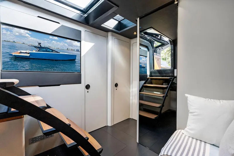 Slide: The Image of Luxurious interior of 2023 Wally WALLYPOWER58 yacht with modern design and staircase. - 26