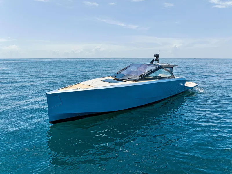 Slide: The Image of 2023 Wally WALLYPOWER58 yacht on open sea, sleek design, sunny day. - 6