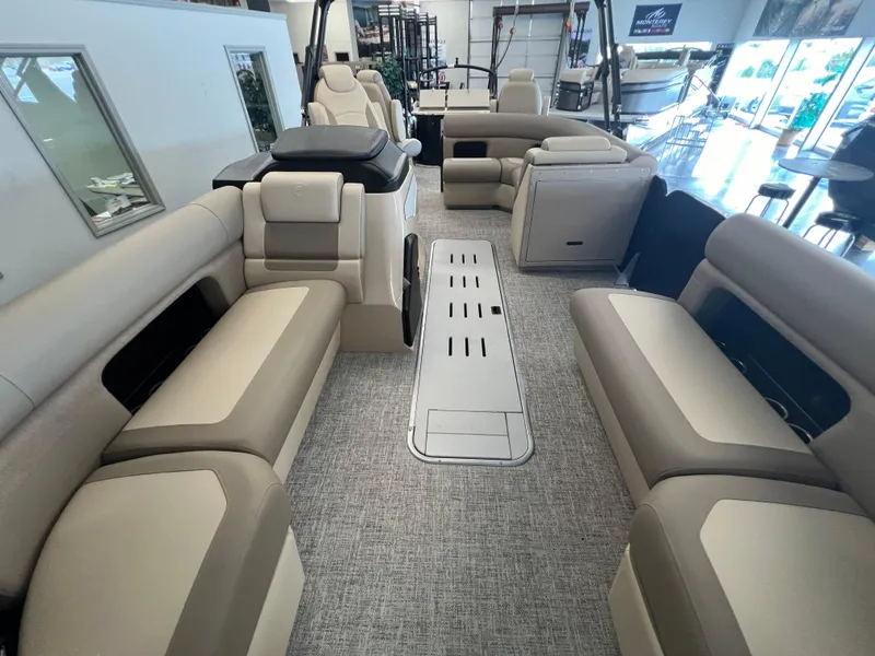 Slide: The Image of 2025 Premier Sunsation 230 Angler interior with spacious seating and modern design. - 13
