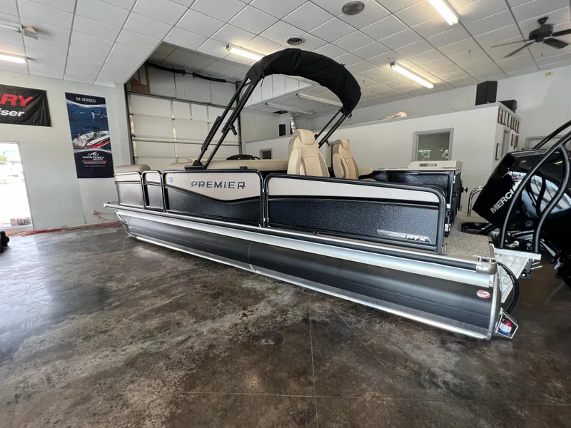Slide: The Image of 2025 Premier Sunsation 230 Angler pontoon boat in showroom. - 3