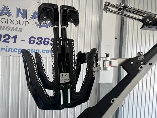 Slide: The Image of 2024 Malibu M220 boat wakeboard rack in a showroom. - 8