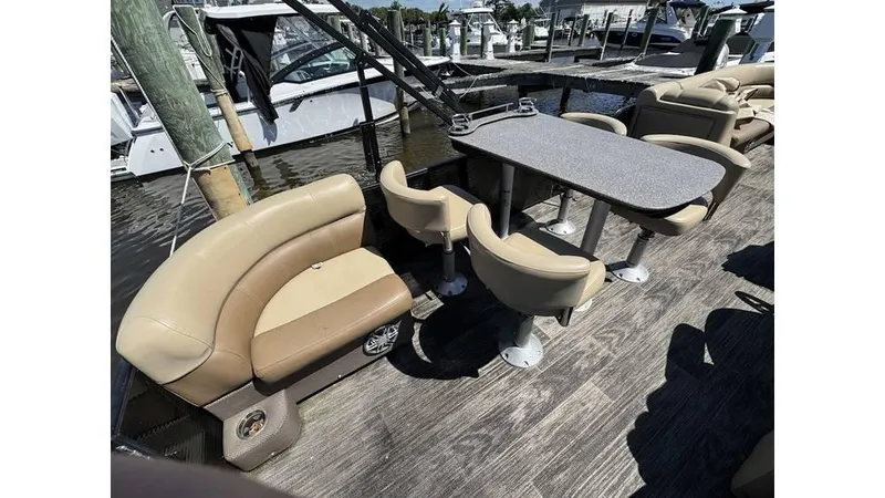 Slide: The Image of Pontoon boat interior with beige seating and table, Godfrey SWEETWATER 2286 MT, 2020 model. - 8