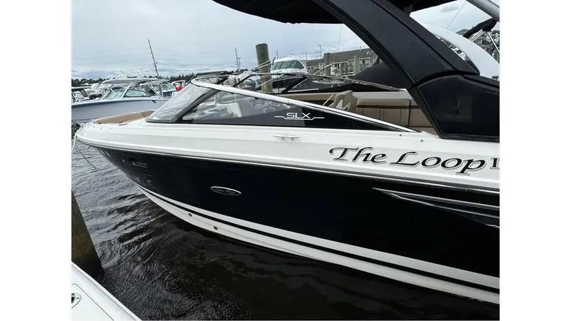 The Image of 2016 Sea Ray 280 SLX boat docked in marina. - 0