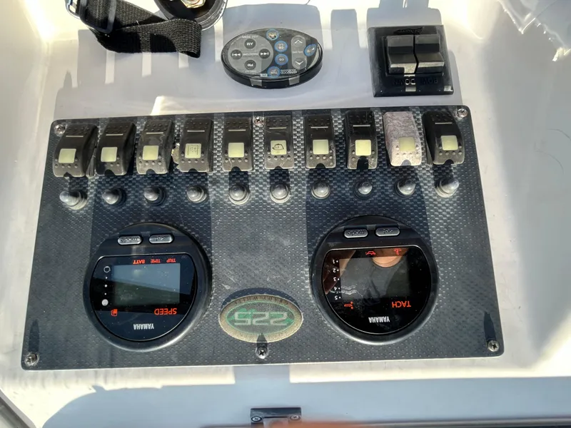 Slide: The Image of Control panel of a 2003 Grady-White Tournament 225 boat with Yamaha gauges. - 7