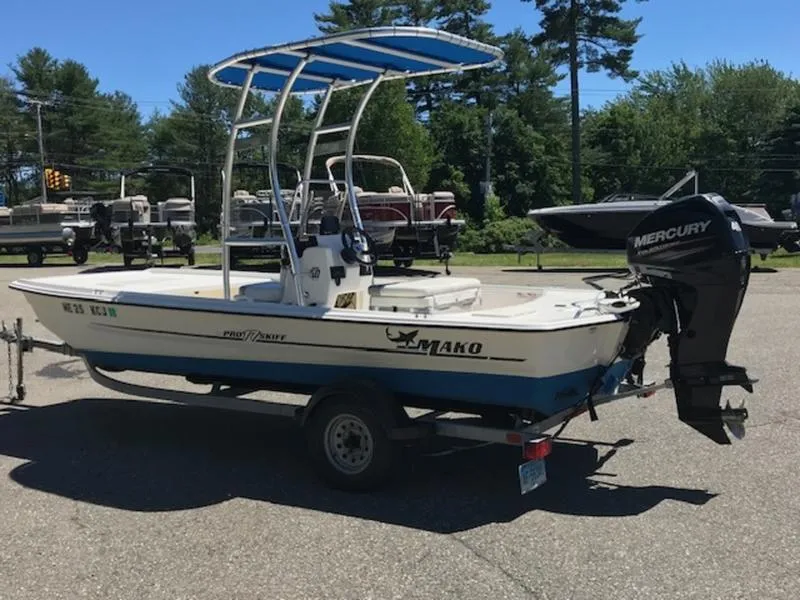 Slide: The Image of 2018 Mako 17 SKIFF CC boat with Mercury outboard motor on trailer. - 6