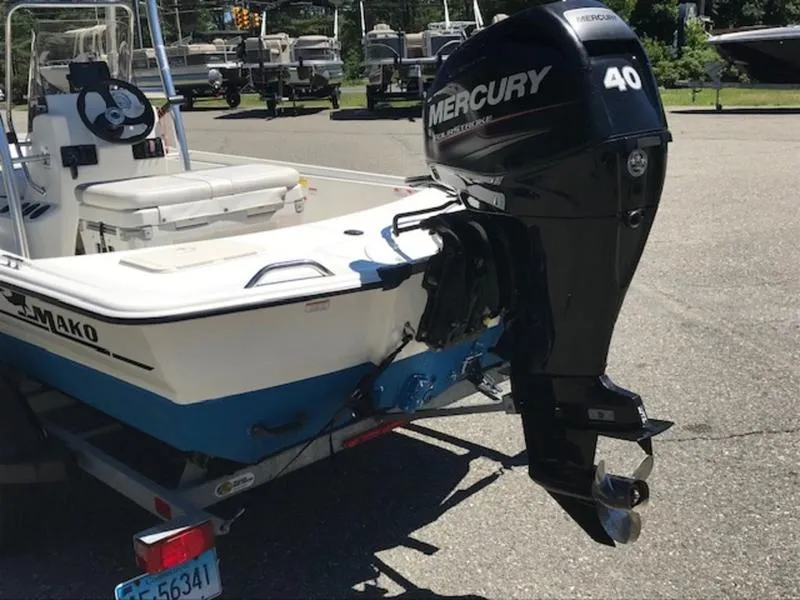 Slide: The Image of 2018 Mako 17 Skiff CC boat with Mercury 40 outboard motor on trailer. - 8