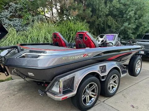 Slide: The Image of 2024 Ranger Z520R Ranger Cup Equipped boat on trailer, parked outdoors. - 5