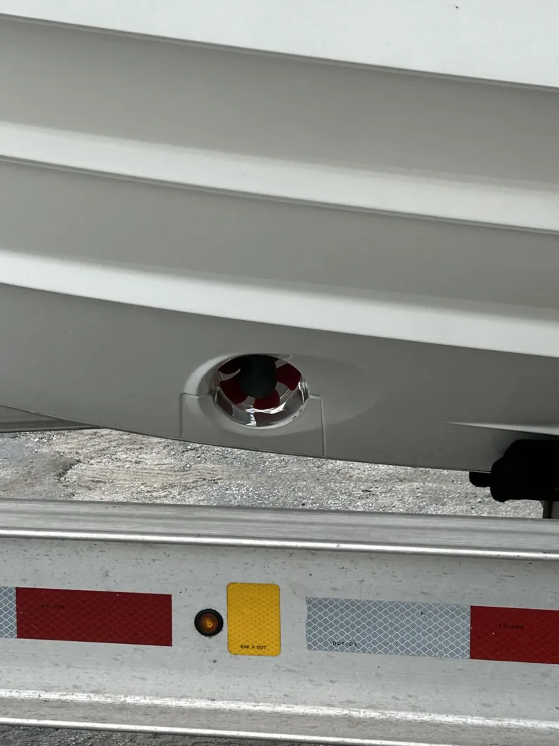 Slide: The Image of 2023 Skamander 850 Voyager boat hull on trailer. - 29