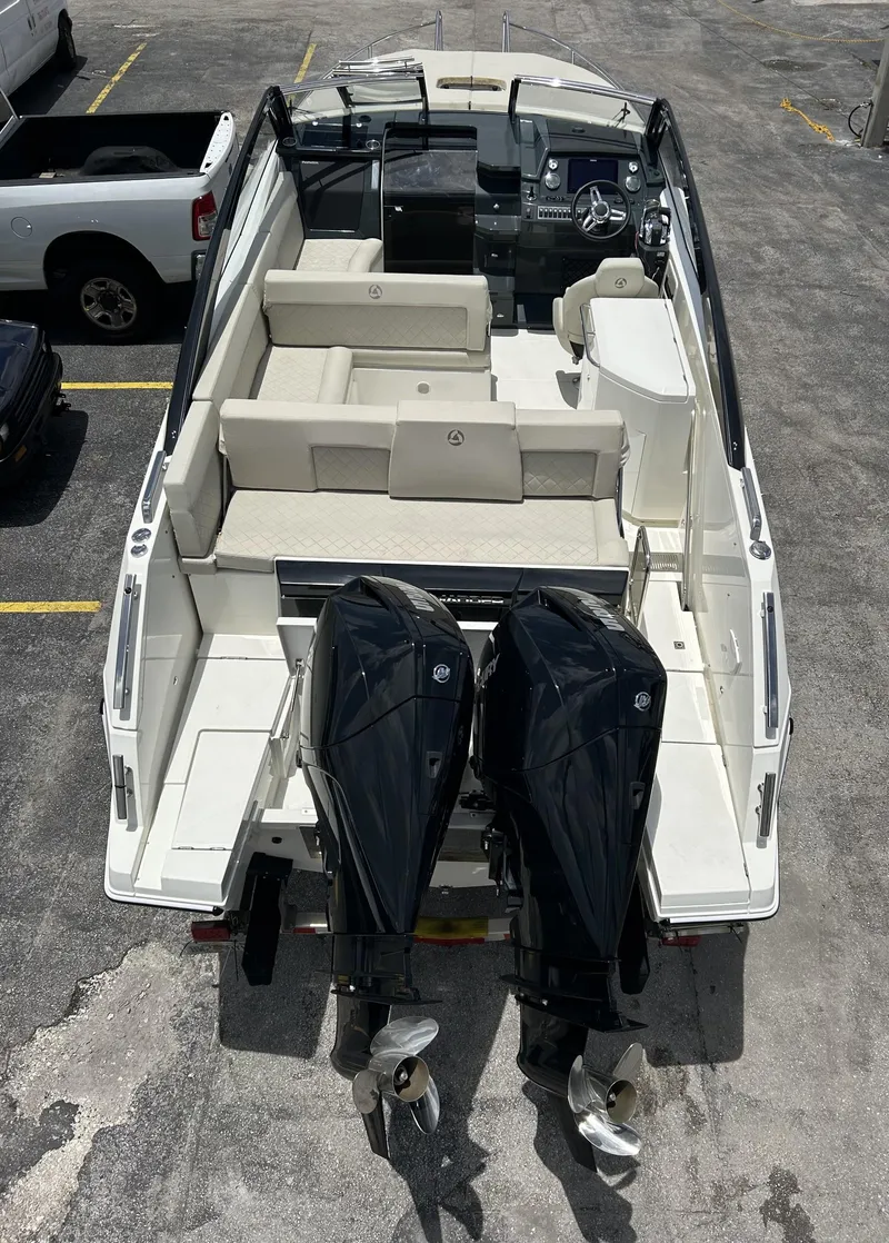 Slide: The Image of 2023 Skamander 850 Voyager boat interior with spacious seating and modern design. - 9