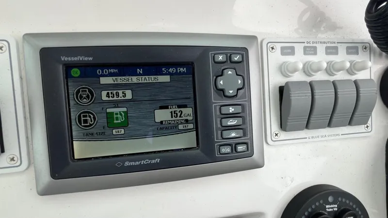 Slide: The Image of SmartCraft VesselView display on 2014 Back Cove 34 boat dashboard. - 23