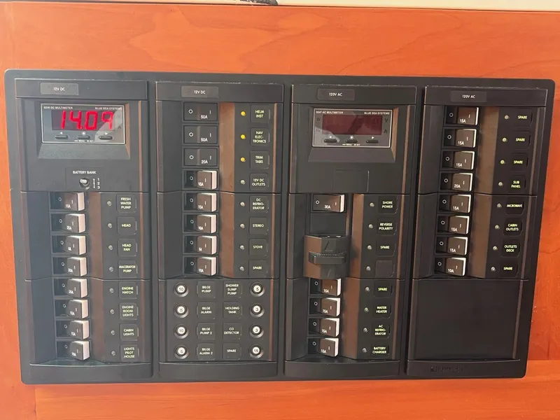 Slide: The Image of Electrical control panel on a 2014 Back Cove 34 boat. - 25