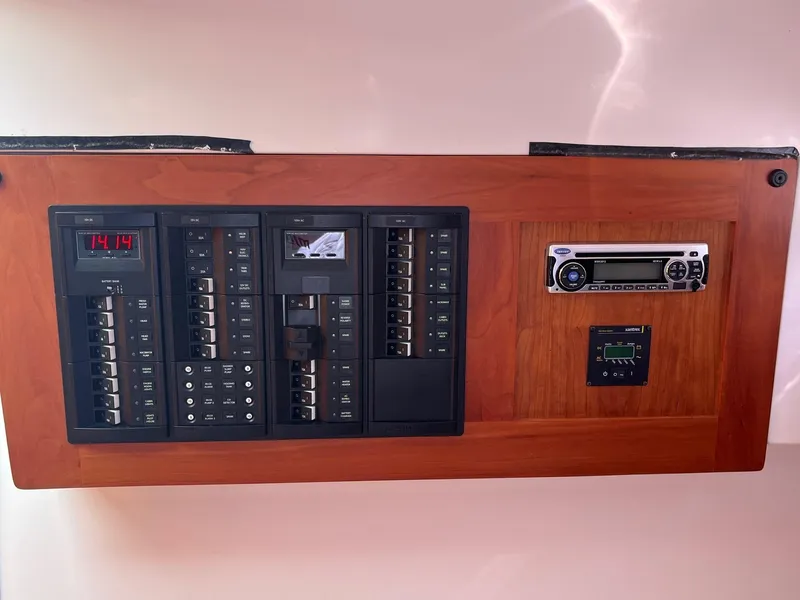 Slide: The Image of Electrical panel and stereo system on a 2014 Back Cove 34 boat. - 26