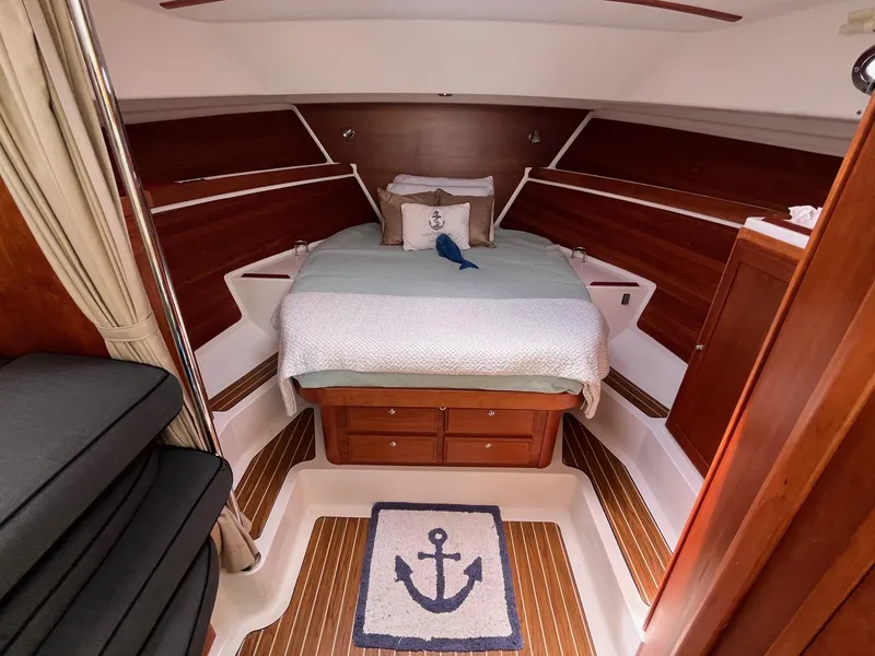 Slide: The Image of Cozy cabin interior of 2014 Back Cove 34 boat with nautical decor. - 29