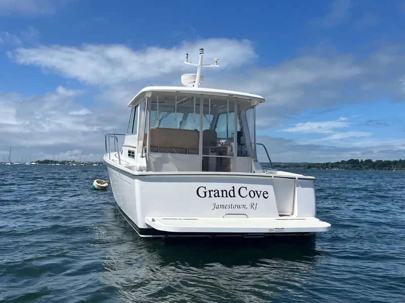 Slide: The Image of 2014 Back Cove 34 boat named "Grand Cove" on water, Jamestown, RI. - 3