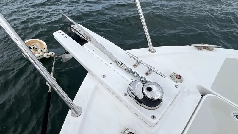 Slide: The Image of Bow of 2014 Back Cove 34 boat with anchor chain and winch. - 6