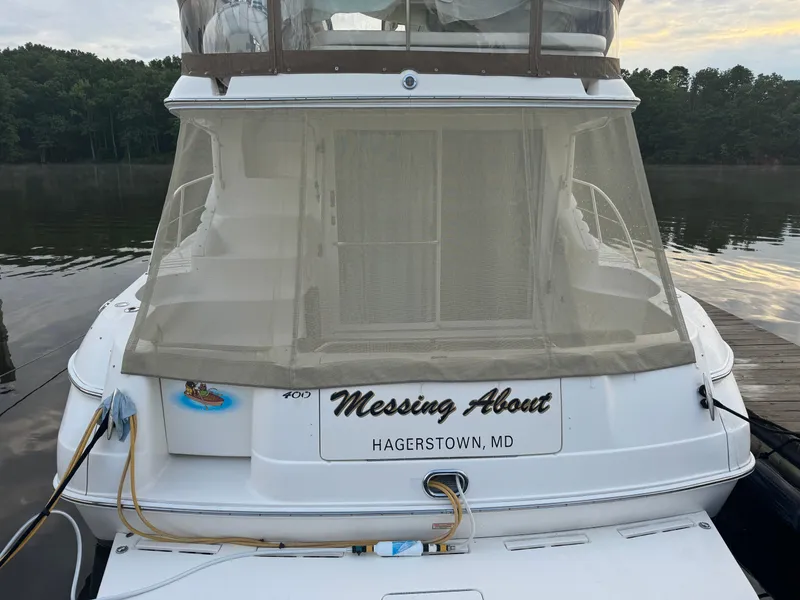 Slide: The Image of 2003 Sea Ray 400 Sedan Bridge boat docked, named "Messing About," Hagerstown, MD. - 3