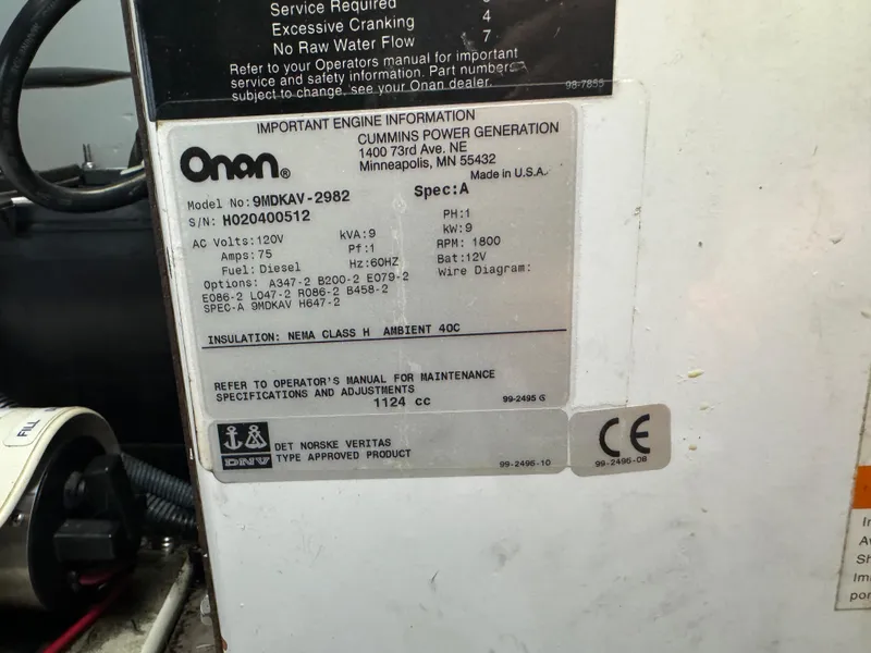 Slide: The Image of Onan engine information label on 2003 Sea Ray 400 Sedan Bridge. - 32