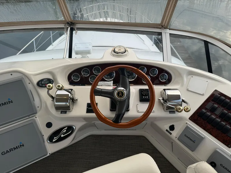 Slide: The Image of Cockpit of 2003 Sea Ray 400 Sedan Bridge with Garmin navigation system. - 5