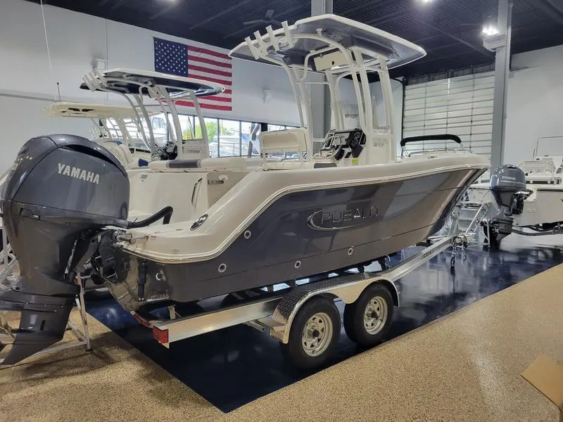 Slide: The Image of 2025 Robalo 222 CC boat with Yamaha engine in showroom. - 11