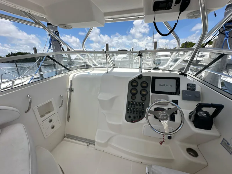 Slide: The Image of 2006 Seaswirl Striper 2901 Walkaround O/B boat cockpit with Garmin navigation system. - 14