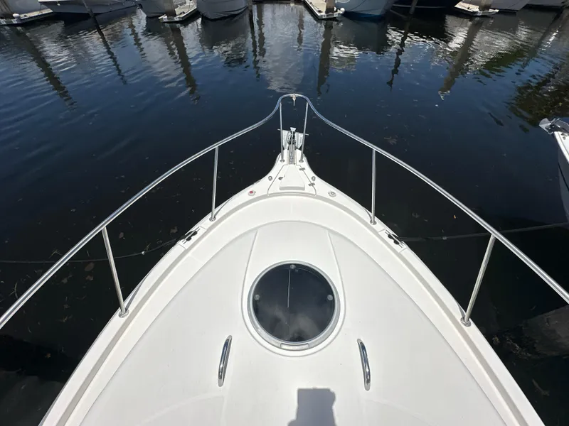 Slide: The Image of 2006 Seaswirl Striper 2901 Walkaround O/B boat bow view at marina. - 23