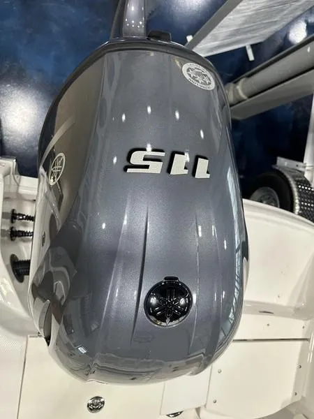 Slide: The Image of 2025 Robalo R 180 boat engine, sleek design, top view. - 16