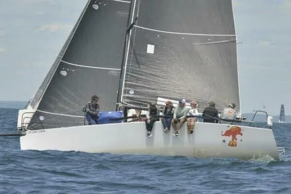 The Image of 1996 Carroll Marine Farr 30 sailboat racing on open water. - 1